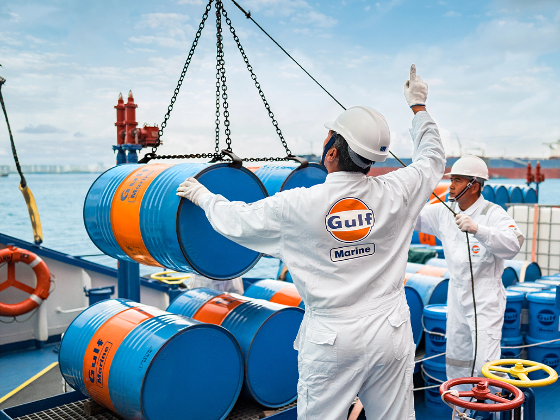 Barrels of Gulf Marine lubricants being unloaded onto a ship
